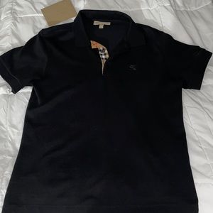 Burberry polo shirt.